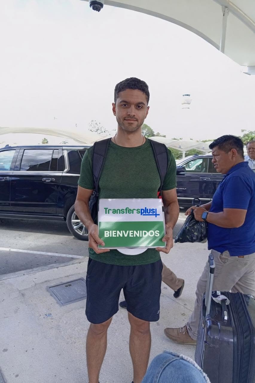 Travelers at Cancun Airport before their private transfer to Costa Mujeres