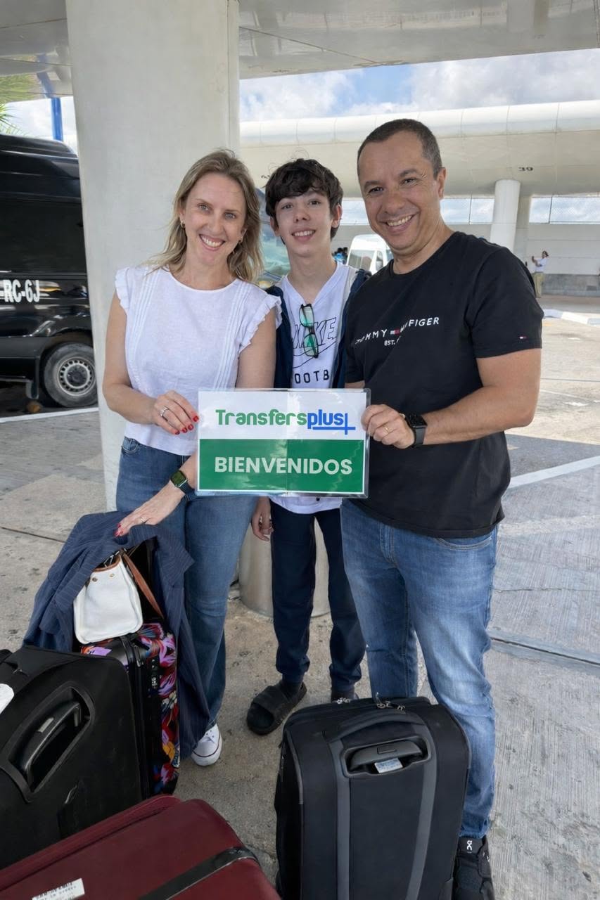 Passengers preparing to travel from Cancun Airport to Costa Mujeres